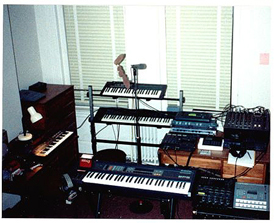 GEAR RIG: Lots of keyboards and compressors and mixers, etc.